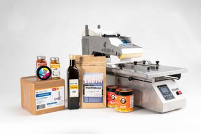 Afinia AF200 label applicator for flat packages and cartons in manufacturing.