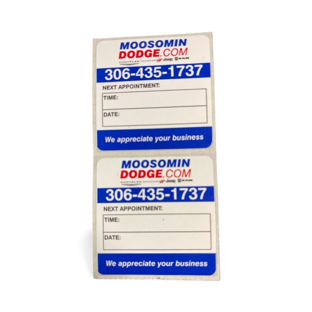 Glossy BOPP label roll with removable adhesive for oil change reminders.